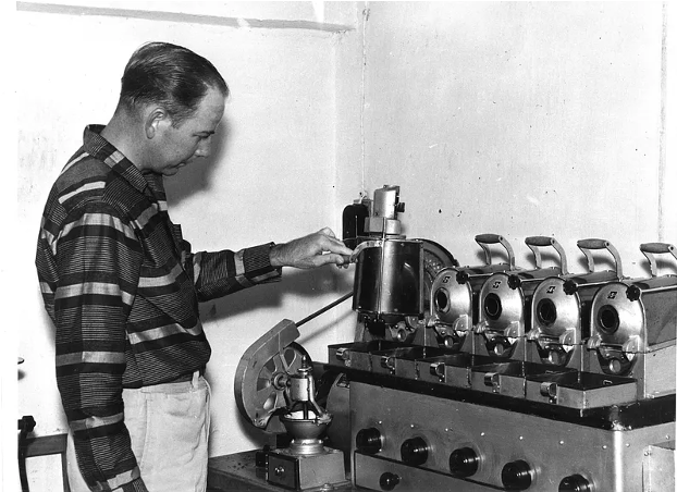 Individual testing coffee for research at First OSU Dean at Haramaya Hugh Rouk established first coffee research center at Haramaya University.