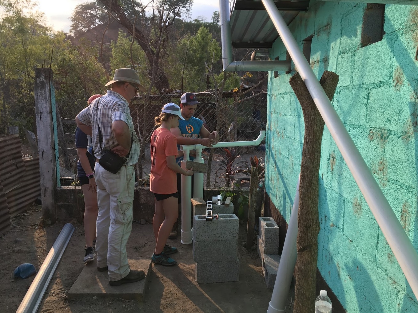 Students build a water pipeline. Students build a water pipeline.