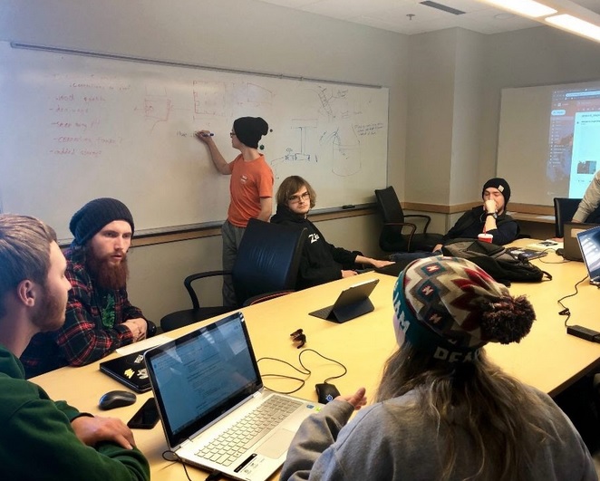 EWB members plan out a project. EWB members plan out a project.